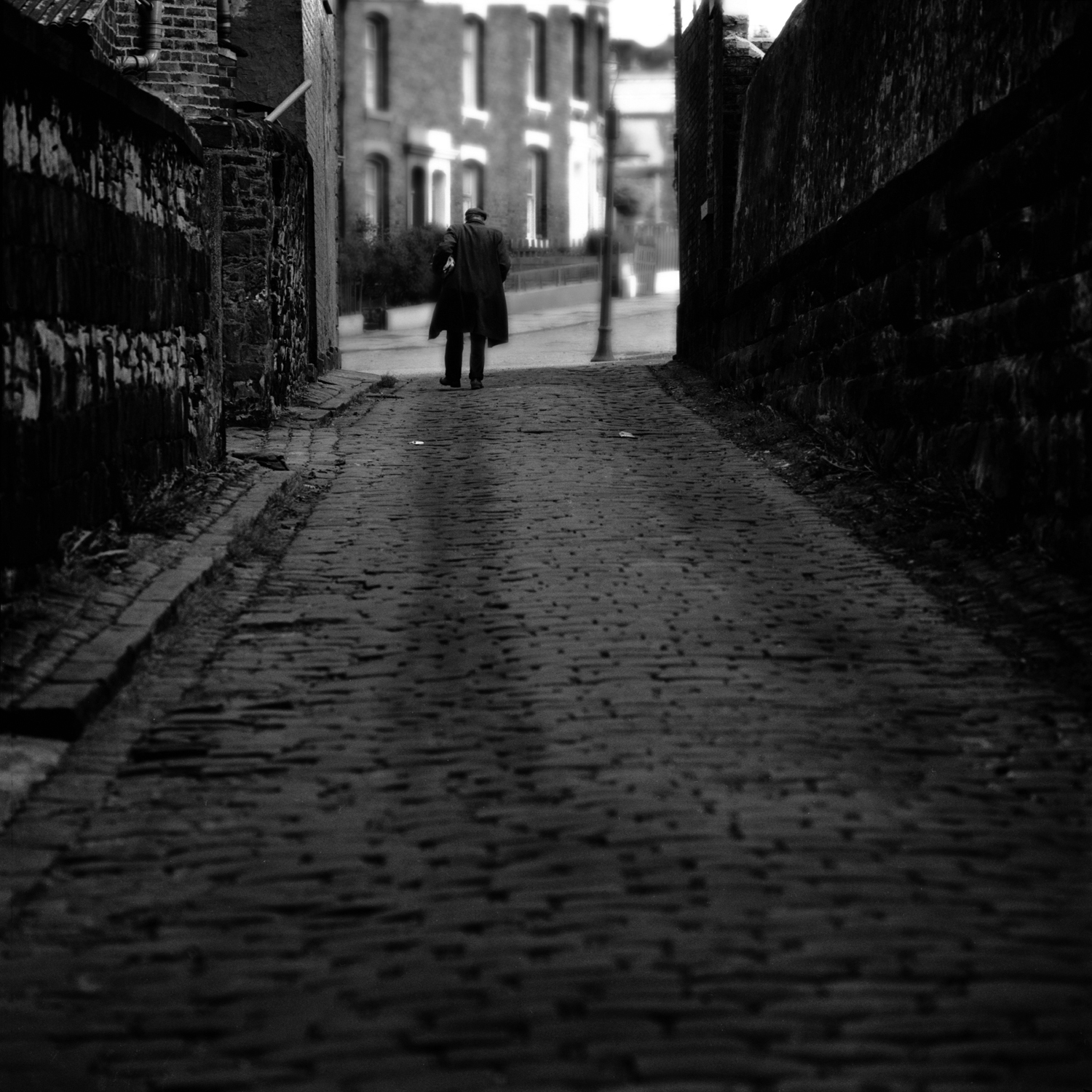 16. man walking home from work, Potteries