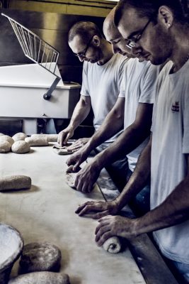 3. bakers forming breads