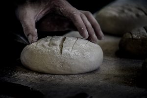 4. preparing bread for oven